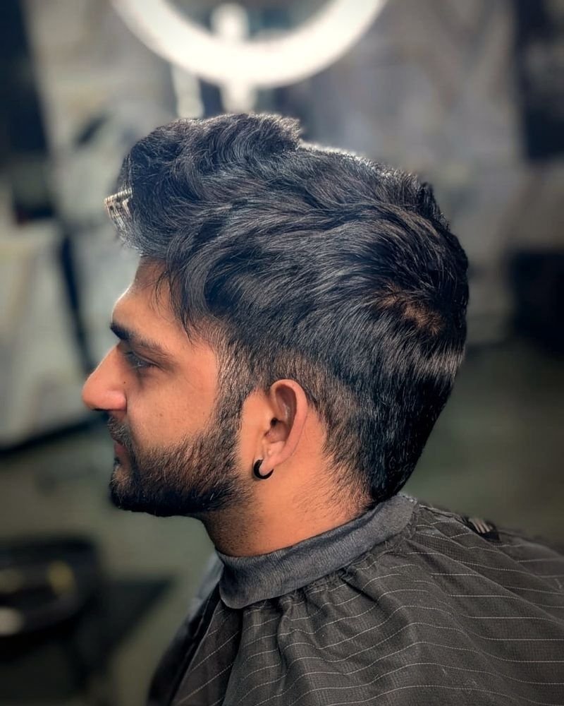 Before: textured top with a skin fade, BC Barber Shop