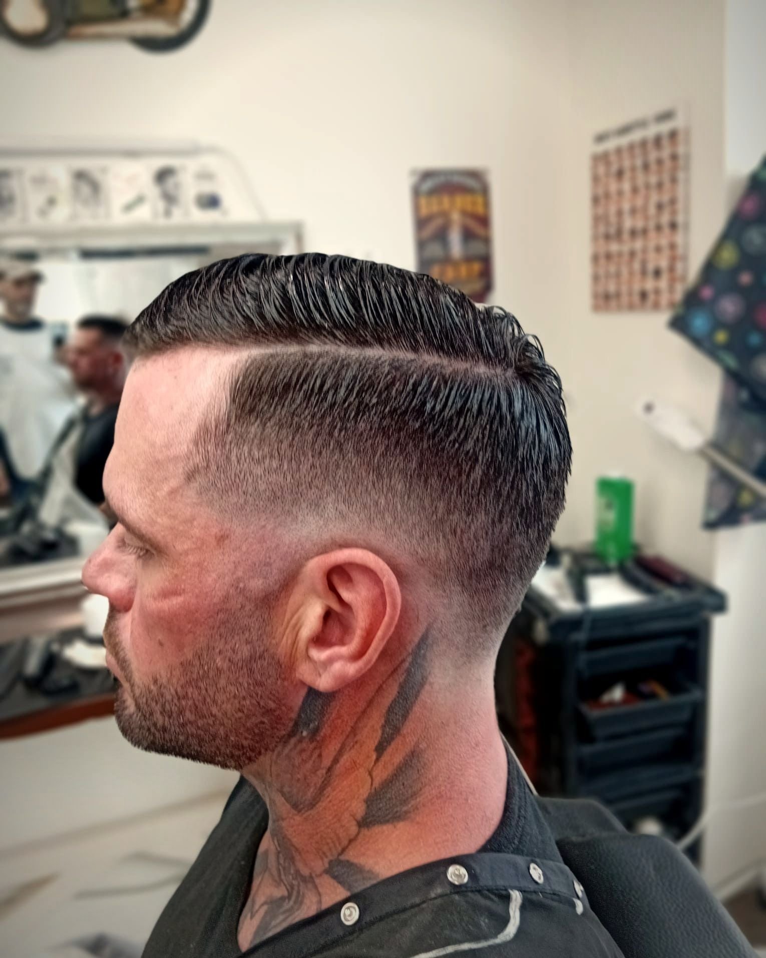 Comb over with a hard part and skin fade, BC Barber Shop