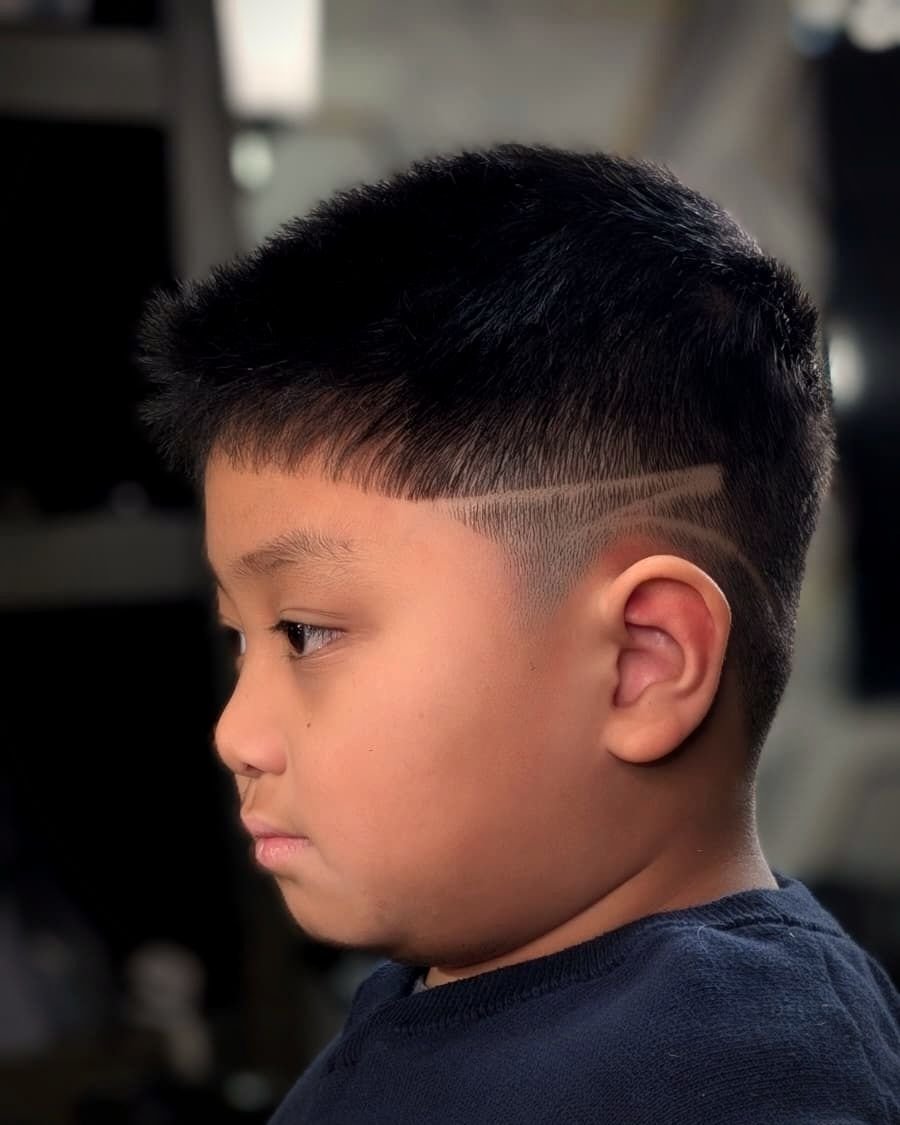 Kids' cut with a shaved design part, BC Barber Shop