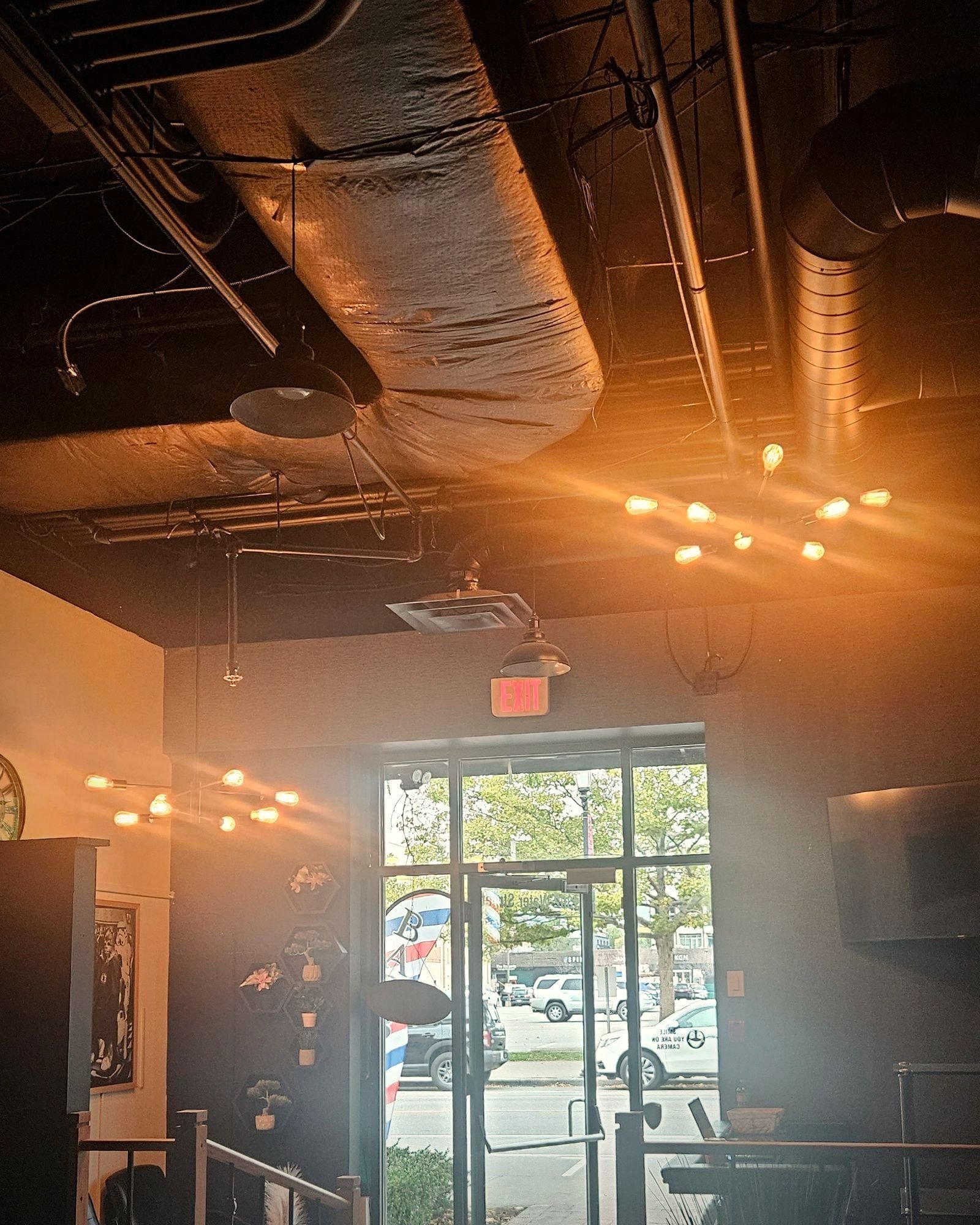 Inside BC Barber Shop: warm wood, Edison bulbs and barber chairs, BC Barber Shop