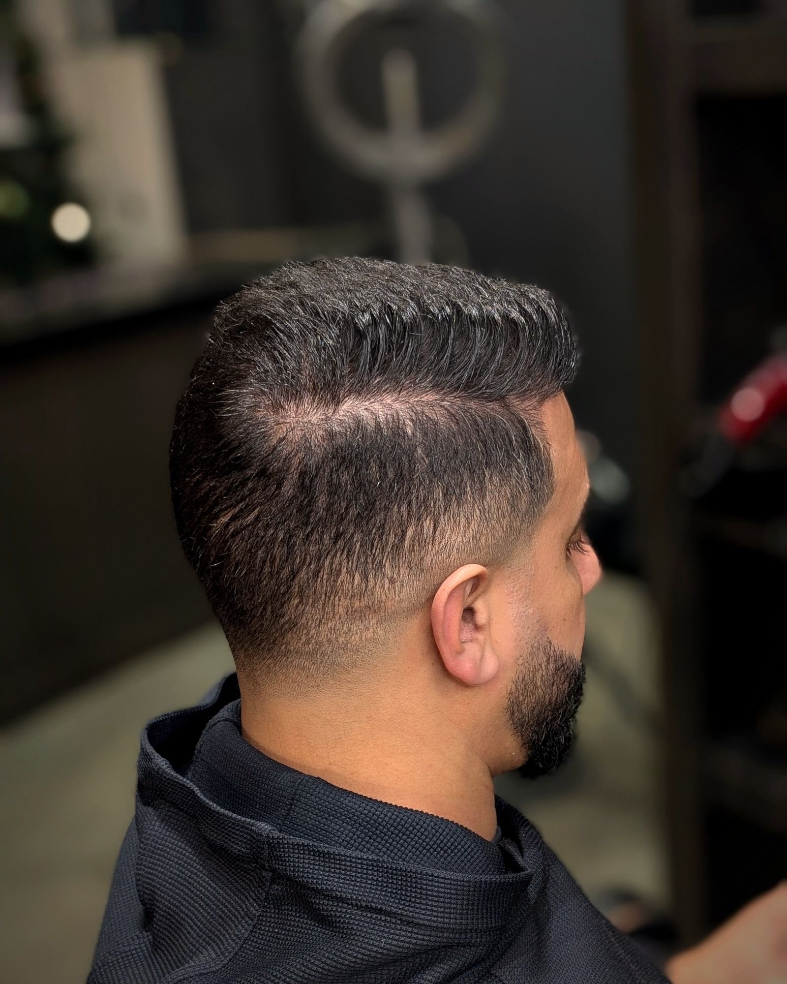 Slick side part with a skin fade, BC Barber Shop