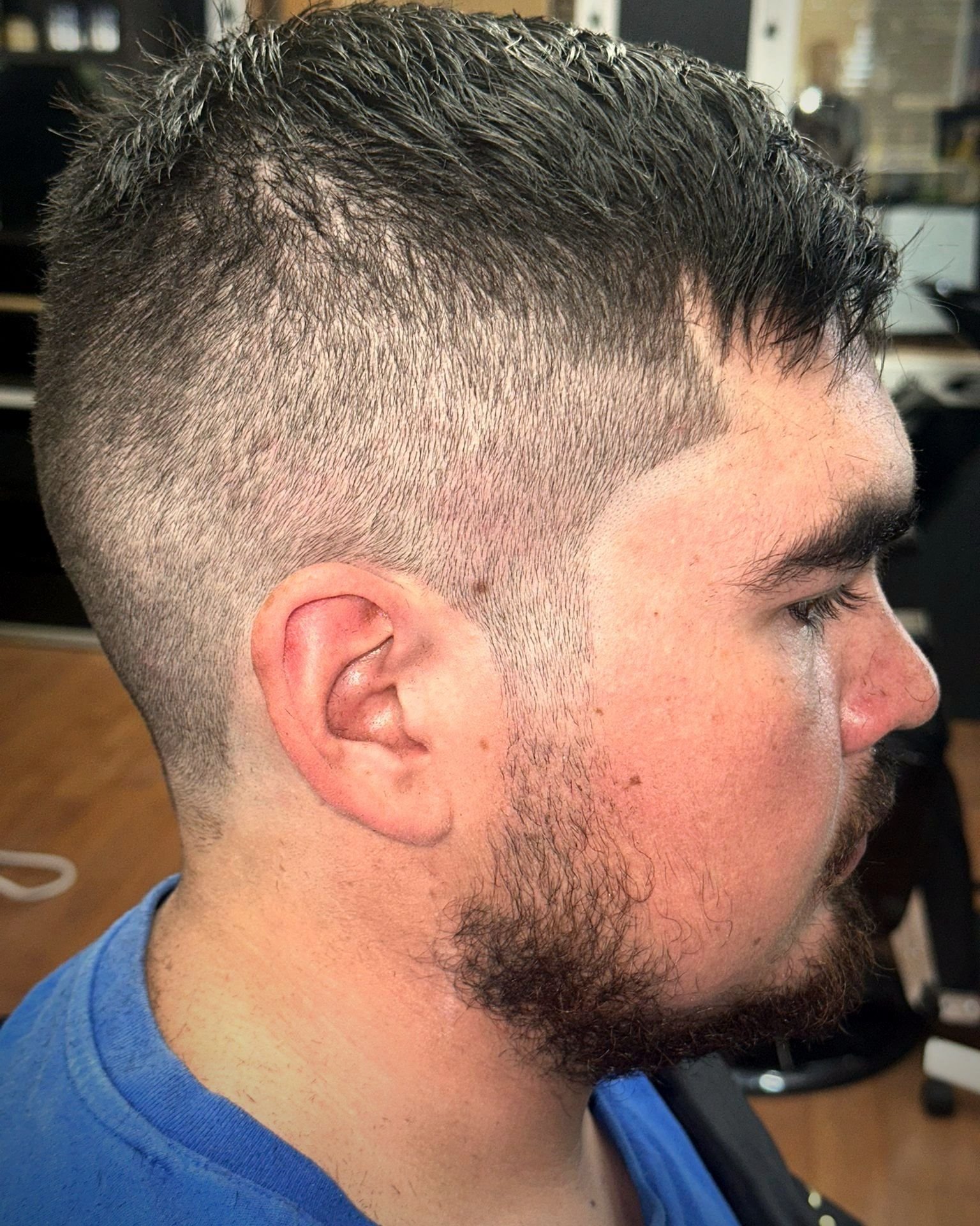Short textured cut with a fade and full beard, BC Barber Shop